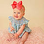 baby, child, smiling, bow, headband, dress, floral, pink_rug, sitting, cute, happy, portrait, infant, skin, hand, feet, indoors, soft_texture, playful, blue_eyes