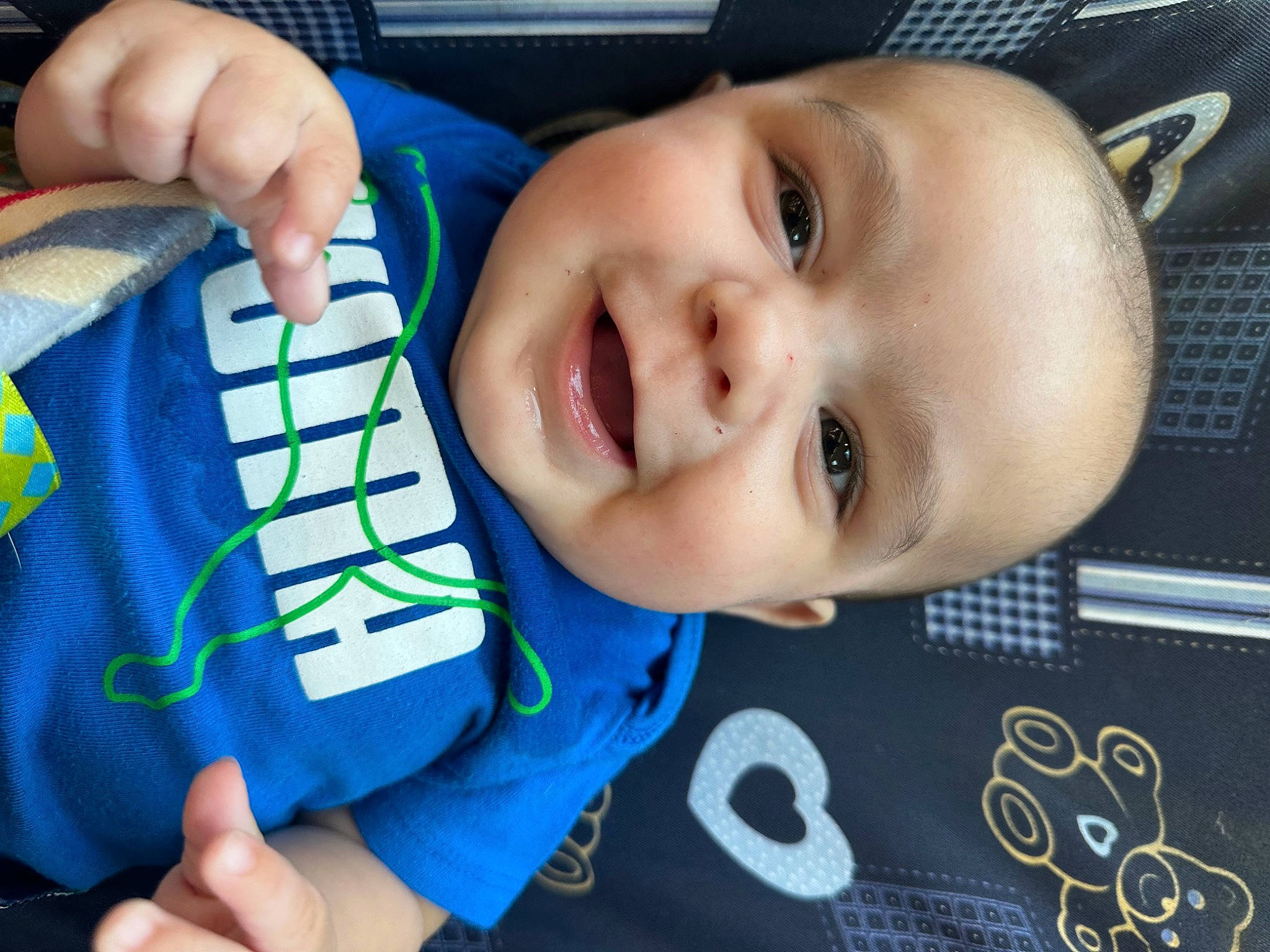 Armando joined the competition — help win amazing prizes! baby, baby_toddler_clothing, blue, cheek, cool, eye, eyebrow, facial_expression, finger, gesture, happy, head, iris, mouth, nose, person, product, skin, sleeve, smile