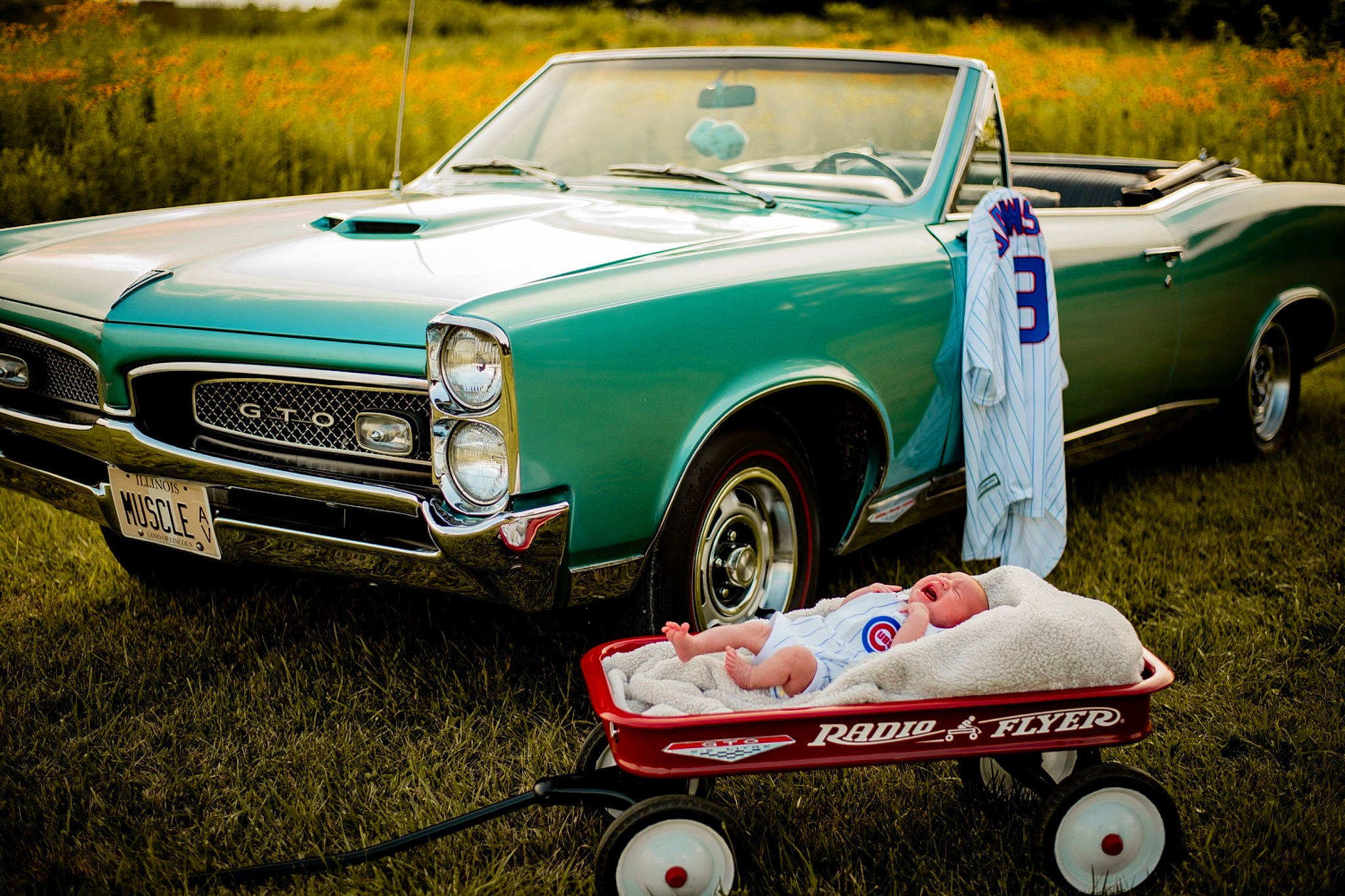 Magnolia is registered to the contest to win money with this photo: automotive_design, automotive_exterior, automotive_fog_light, automotive_wheel_system, bumper, car, classic, classic_car, green, grille, hardtop, hood, kit_car, motor_vehicle, person, personal_luxury_car, plant, tire, vehicle, vehicle_registration_plate