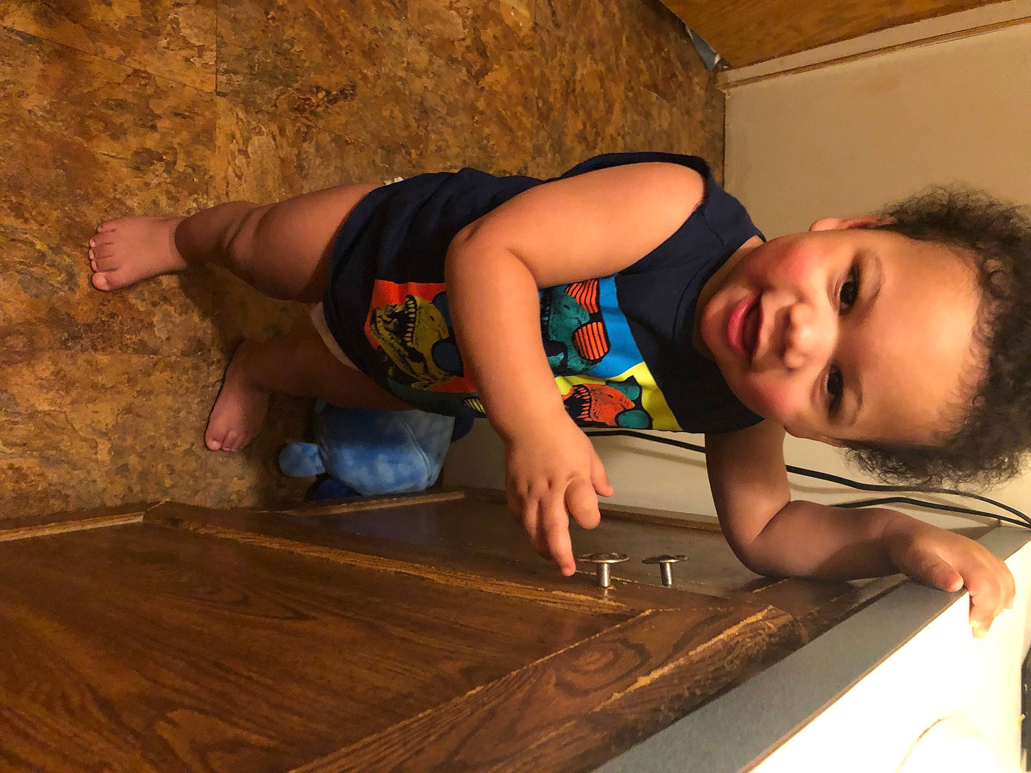 William is registered to the contest to win money with this photo: brown, floor, flooring, fun, hardwood, leg, person, wood