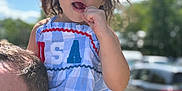 Cora joined the competition — help win amazing prizes! child, toddler, sunglasses, blue_dress, outdoor, sunny, person, shoulders, adult, hair, hand, face, smile, background, people, car, glasses, summer, fun, day