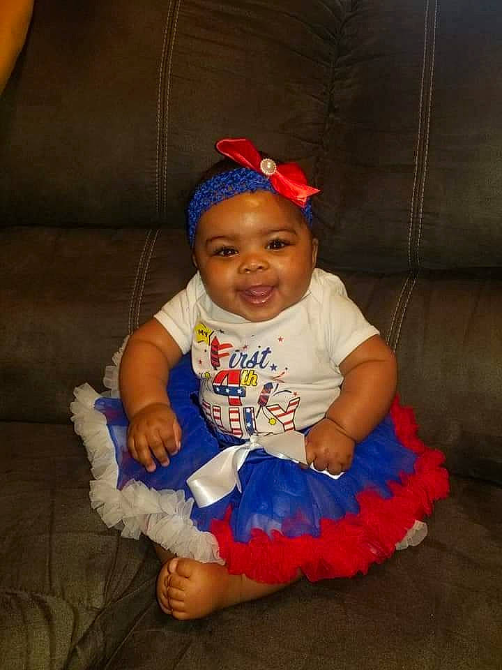 Ari joined the competition — help win amazing prizes! baby, baby_toddler_clothing, child, costume, fun, hair_accessory, headgear, headwear, joy, person, sitting, smile, toddler