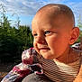 Victor joined the competition — help win amazing prizes! baby, child, face, blue_eyes, plaid_jacket, striped_shirt, outdoor, sunlight, golden_hour, portrait, close_up, person, nature, greenery, sky, clouds, cute, happy, head, expression