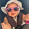 accessory, arm, baby, buckle, car_seat, child, close_up, cute, hand, infant, pink_sunglasses, reflection_in_glasses, seatbelt, sippy_cup, smile, stroller, summer, sun_hat, sunglasses, sunshade