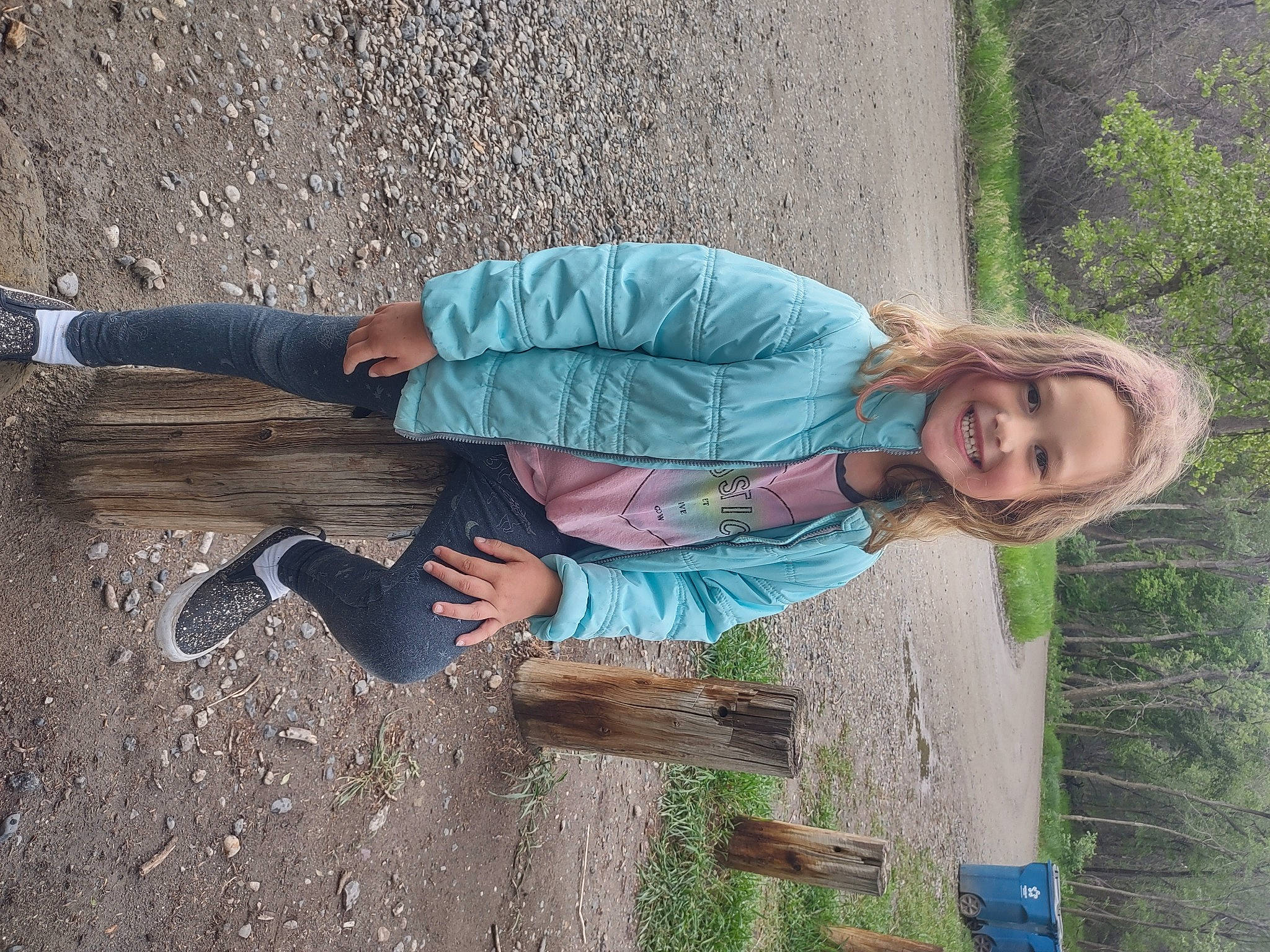 Tegan is registered to the contest to win money with this photo: adaptation, fun, grass, happy, human_leg, joy, leisure, nature, people_in_nature, person, plant, shoe, sitting, smile, soil, thigh, travel, tree, trunk, vacation