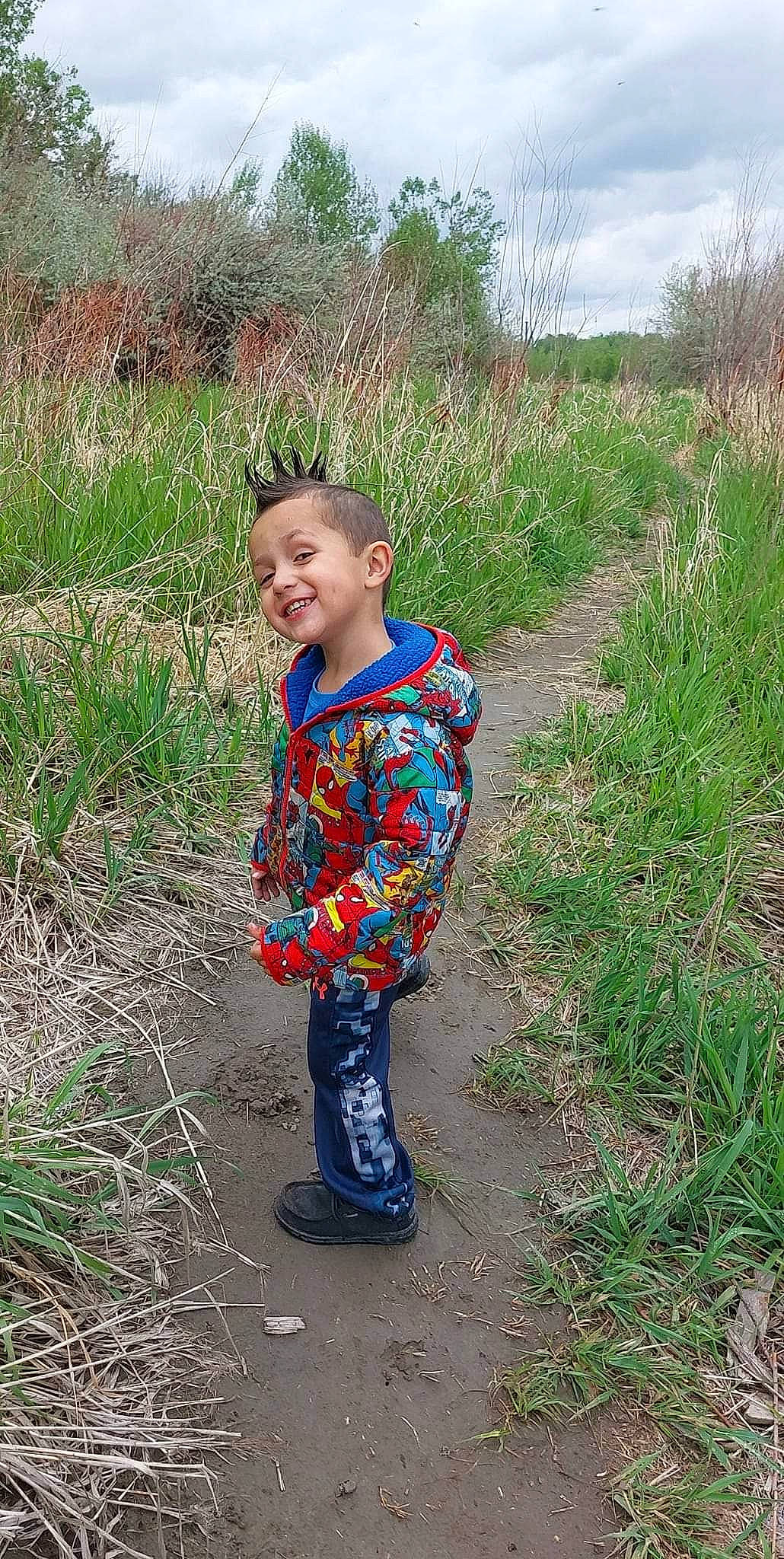 Finley joined the competition — help win amazing prizes! child, electric_blue, field, fun, grass, grassland, happy, human_body, joy, landscape, leisure, natural_landscape, people_in_nature, person, plant, recreation, sky, smile, soil, toddler