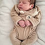 Lena participe au concours pour gagner de l'argent avec cette photo : baby, beige, blanket, child, closed_eyes, cozy, cute, face, feet, hands, indoors, infant, newborn, onesie, peaceful, plush, portrait, resting, sleeping, soft