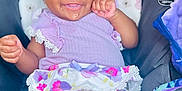 Jahmira joined the competition — help win amazing prizes! baby, bunny_ears, car_seat, child, cushion, cute, drool, face, floral_pattern, hands, happy, headband, indoors, infant, playful, portrait, purple_clothing, seat_belt, skin, smiling