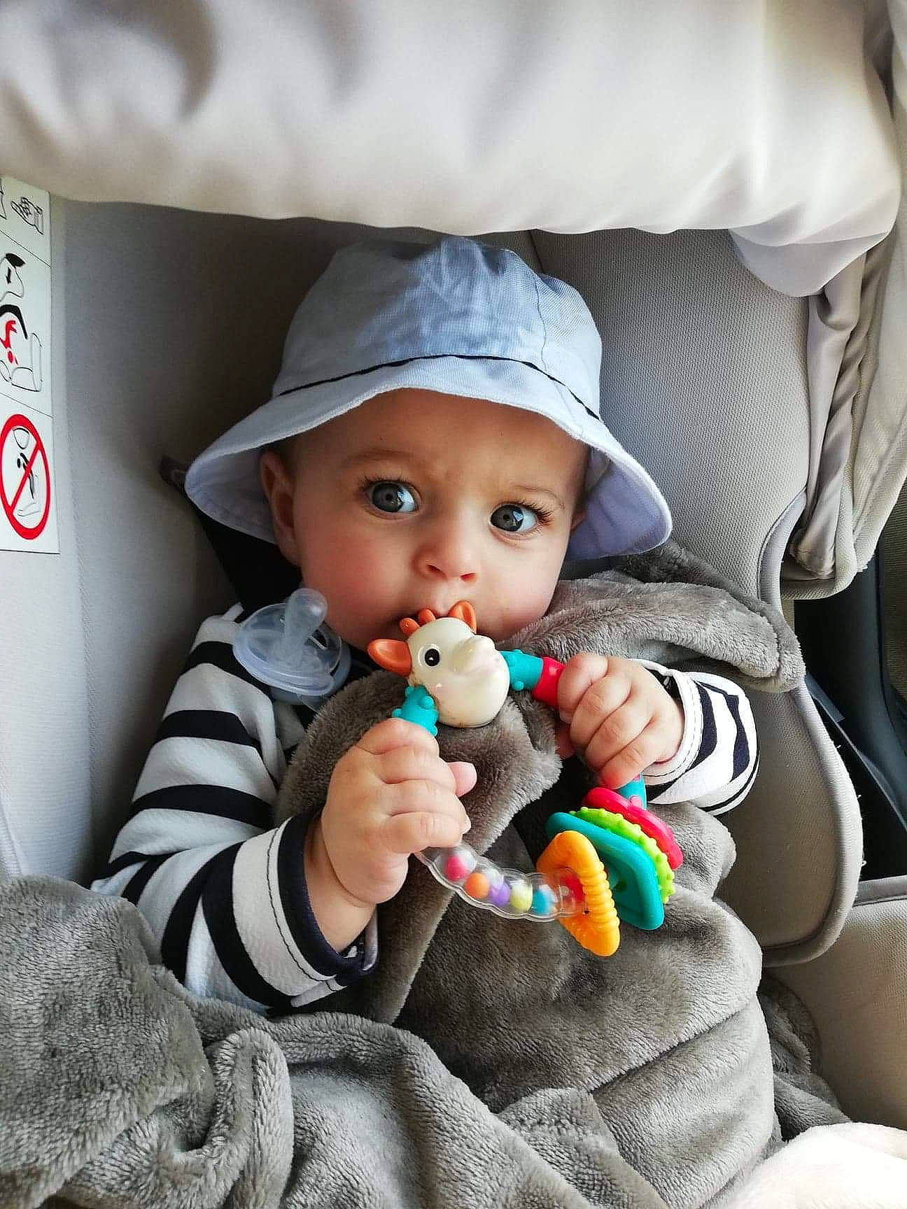Tatiana participe au concours pour gagner de l'argent avec cette photo : auto_part, baby, baby_products, car_seat, child, headwear, person, play, product, stuffed_toy, toddler, toy