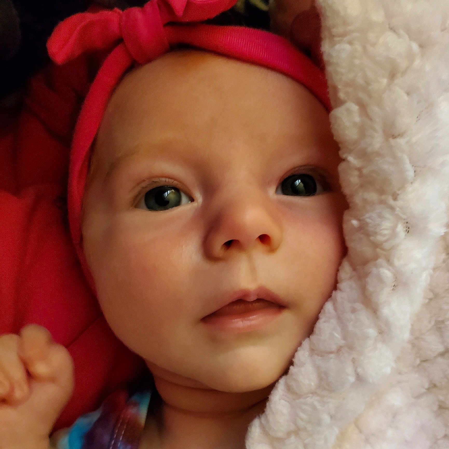 Jacquelyn is registered to the contest to win money with this photo: baby, beauty, cheek, child, chin, close_up, ear, eye, eyebrow, face, forehead, hair_accessory, head, lip, mouth, nose, organ, pink, skin, toddler