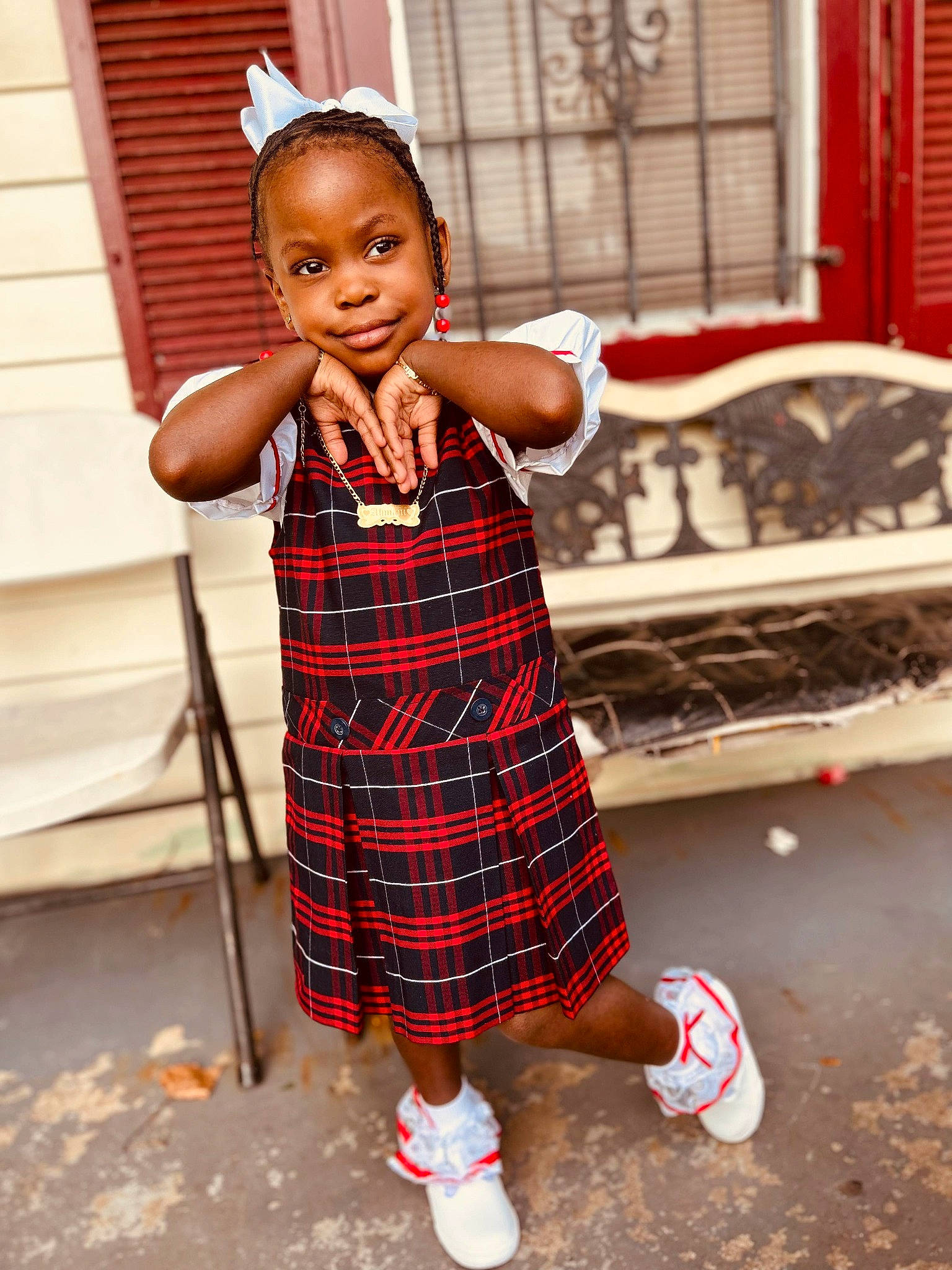 Ah'Mani De'Shay is registered to the contest to win money with this photo: child, dress, fashion_design, fun, happy, head, human_leg, joy, pattern, person, plaid, portrait_photography, sitting, sleeve, smile, snapshot, sneakers, t_shirt, tartan, toddler