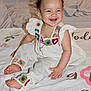 Renata joined the competition — help win amazing prizes! baby, child, smiling, sitting, bed, blanket, colorful_clothing, crochet, footwearless, happy, indoors, portrait, cute, pink_flower, hair_accessory, jewelry, skin, person, infant, toddler
