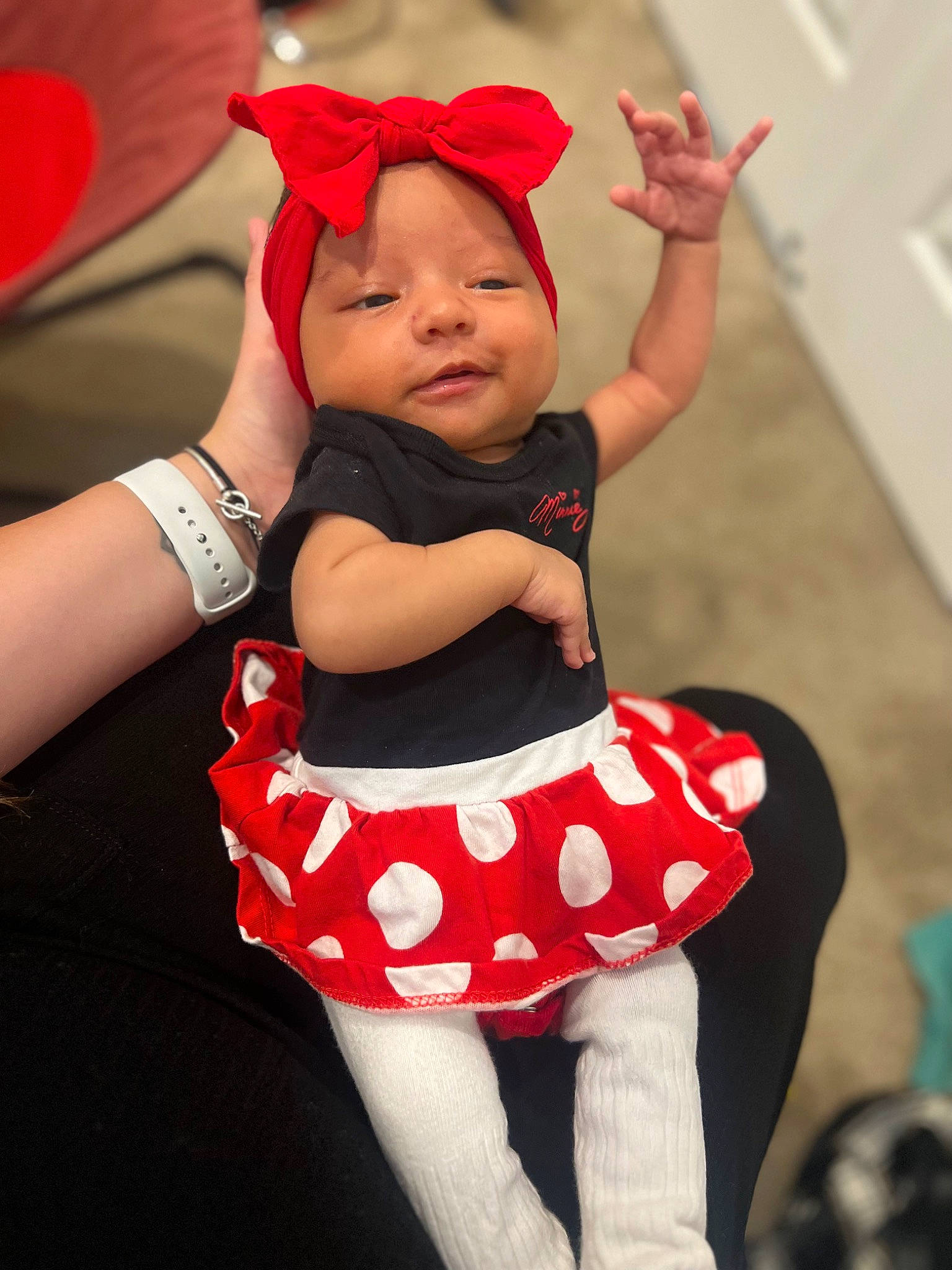 Jordyn is registered to the contest to win money with this photo: abdomen, baby, baby_toddler_clothing, event, face, fun, gesture, happy, hat, headwear, human_leg, knee, pattern, person, pink, red, sleeve, sock, thigh, toddler