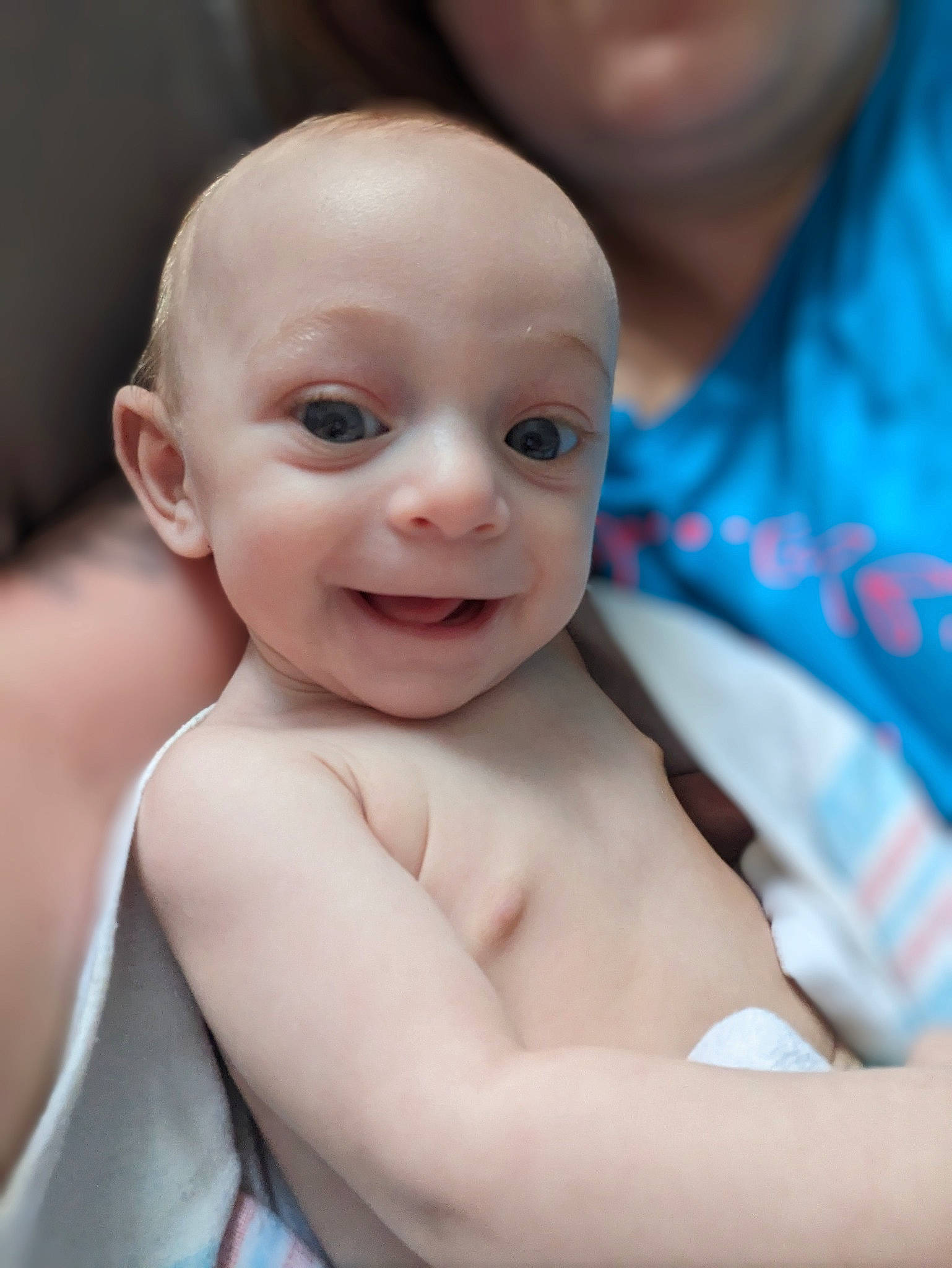 Elias is registered to the contest to win money with this photo: baby, cheek, chest, chin, ear, eye, eyebrow, eyelash, face, happy, head, human_body, iris, lip, mouth, neck, nose, person, shoulder, skin