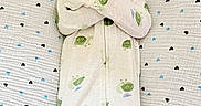 Connor is registered to the contest to win money with this photo: adorable, baby, blanket, child, comfortable, cozy, cute, heart_pattern, indoors, infant, lying_down, newborn, onesie, peaceful, portrait, resting, sleeping, small, soft, turtle_pattern