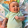 Connor joined the competition — help win amazing prizes! baby, infant, smile, onesie, blanket, animal_print, cheeks, happy, lying_down, cute, child, playmat, face, skin, expression, small_hand, indoors, young, portrait, baby_girl_or_boy