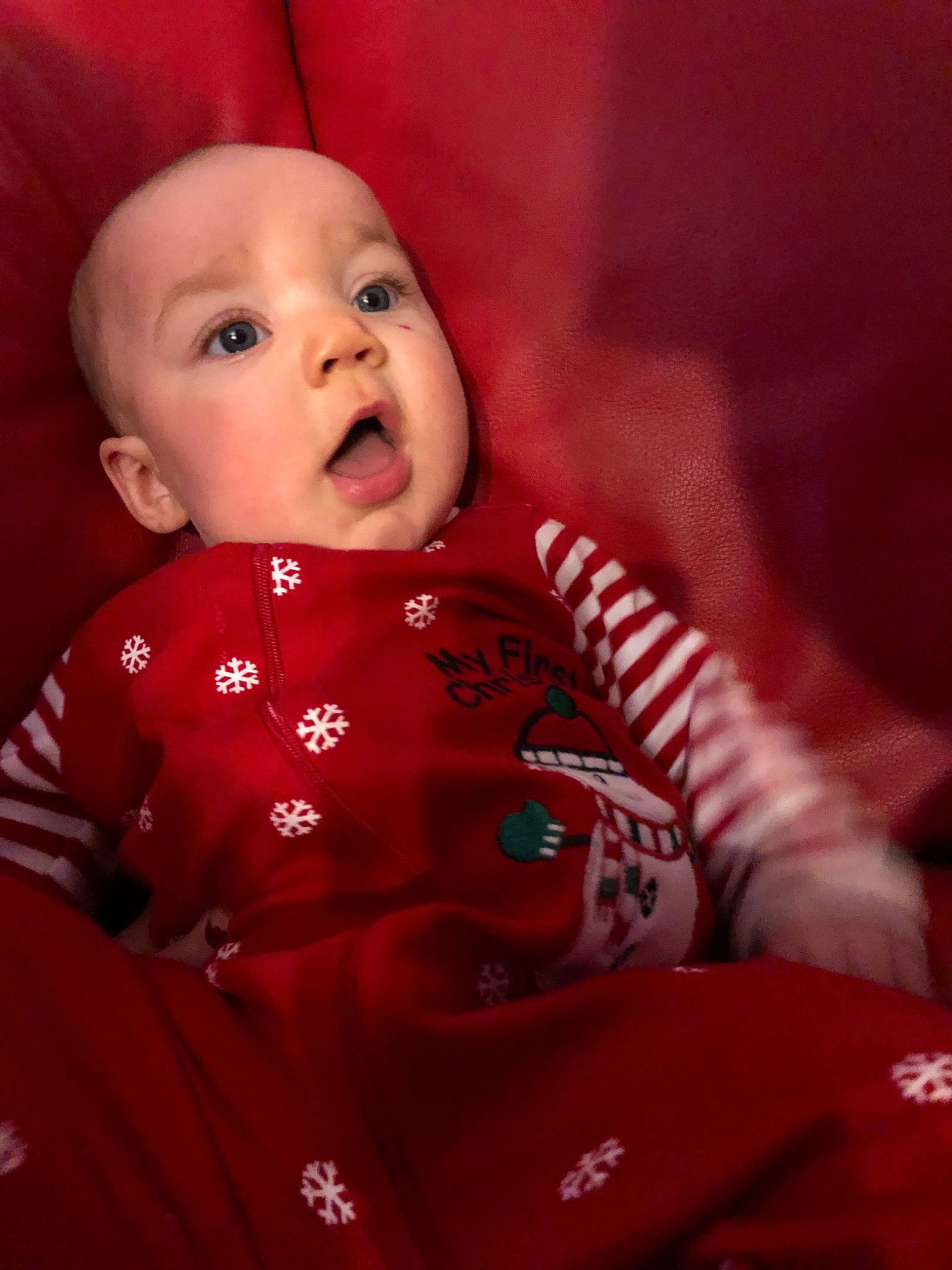 Taryn is registered to the contest to win money with this photo: baby, cheek, child, eye, face, facial_expression, head, lip, mouth, nose, person, portrait_photography, red, skin, smile, surprise, toddler