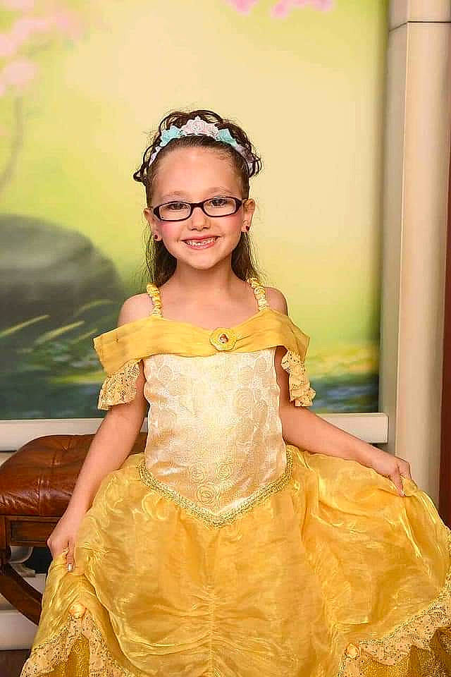 Giavonna is registered to the contest to win money with this photo: bridal_accessory, bridal_party_dress, child, child_model, clothing, costume, dress, fashion_accessory, fashion_design, gown, hair_accessory, headpiece, joy, peach, person, smile, toddler, yellow