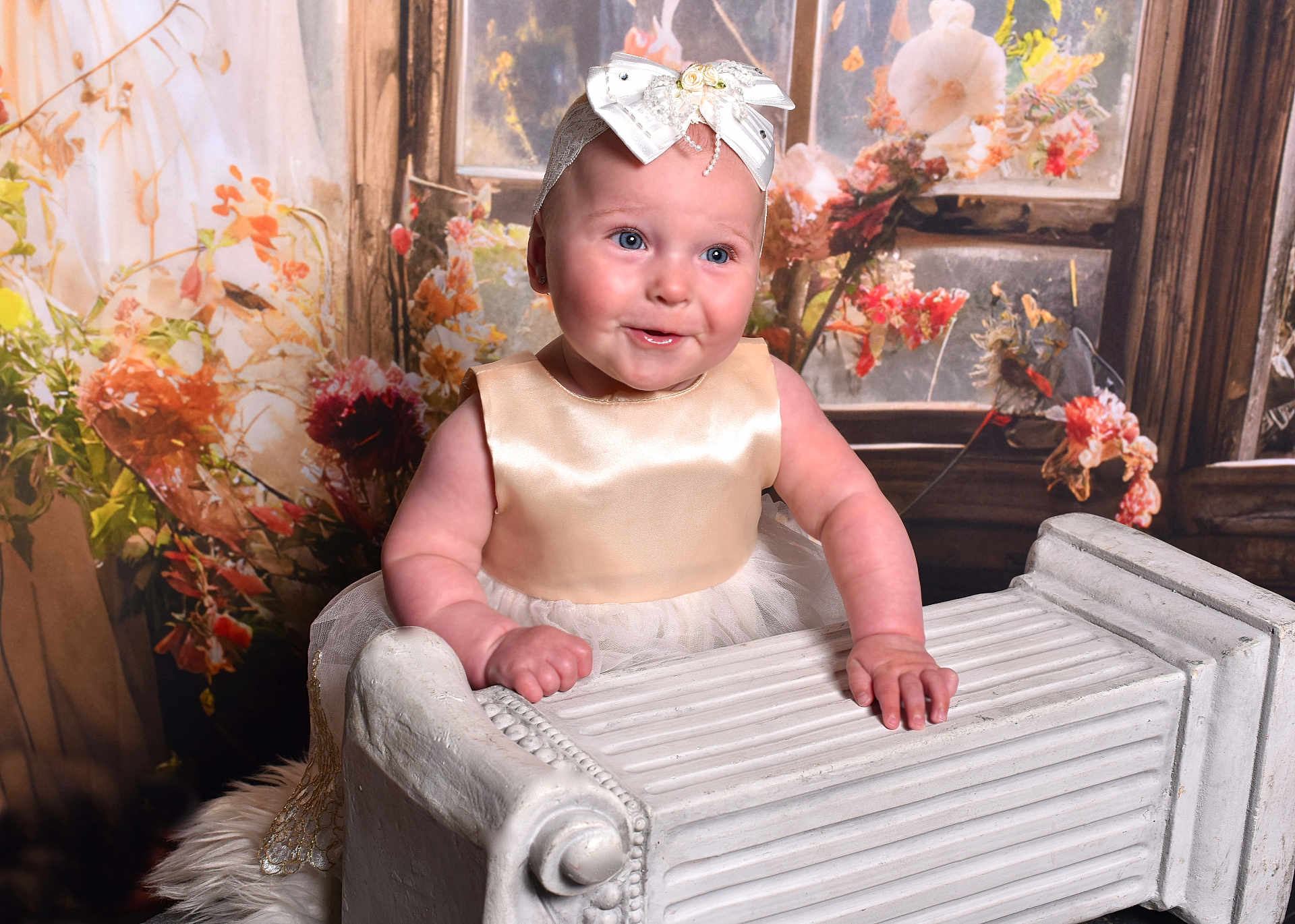 Evie is registered to the contest to win money with this photo: baby, child, smiling, dress, headband, bow, radiator, vintage, flower, floral, background, indoor, portrait, cute, chubby, blue_eyes, skin, hands, window, decor