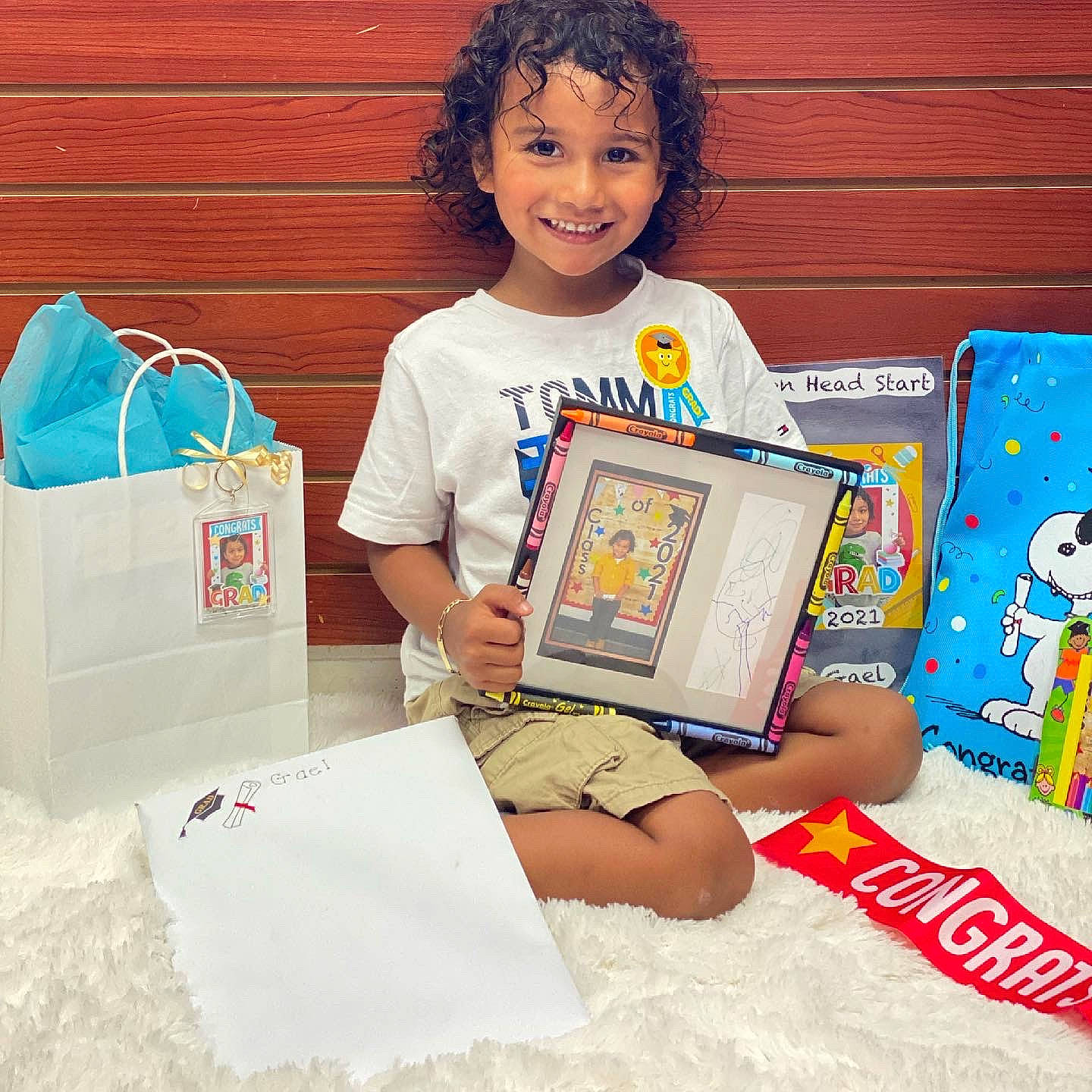 Gael joined the competition — help win amazing prizes! art, bag, box, child, event, fun, happy, joy, linens, luggage_and_bags, paper_bag, person, play, room, sharing, shelf, shorts, sleeve, smile, t_shirt