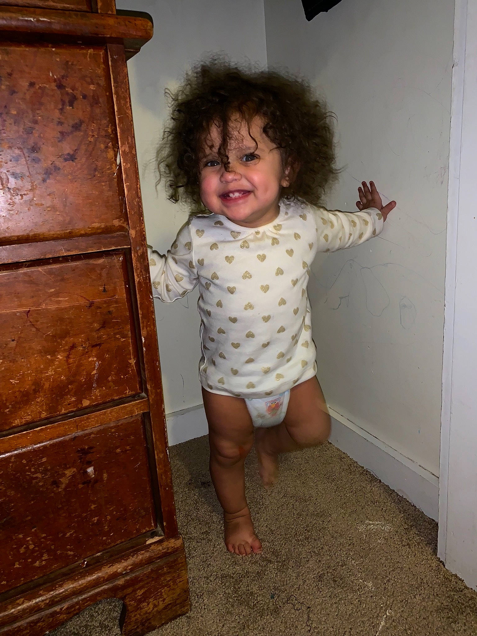 Janessa joined the competition — help win amazing prizes! arm, child, finger, floor, flooring, fun, girl, hand, human_hair_color, joint, joy, leg, organ, pattern, person, shoulder, sitting, skin, standing, textile