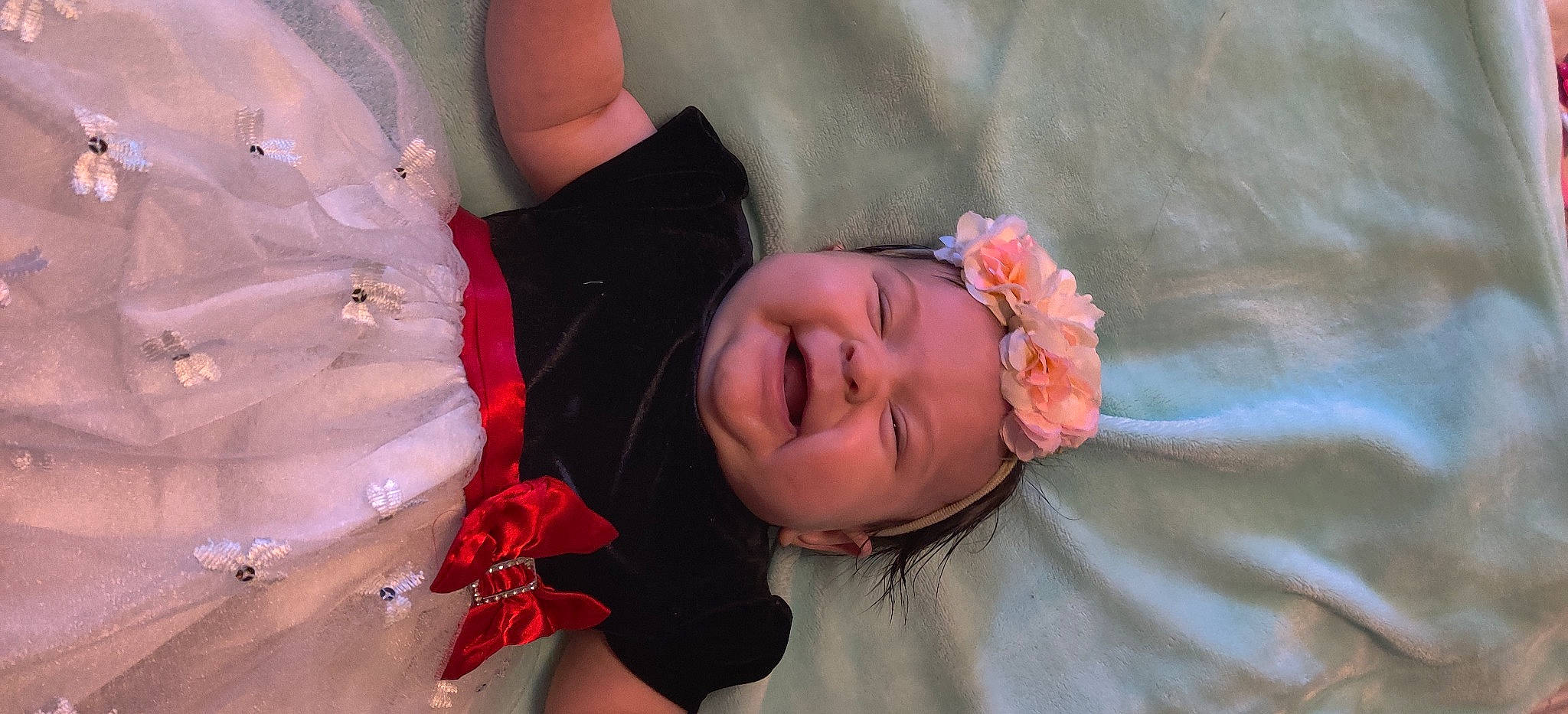 Maraylah is registered to the contest to win money with this photo: child, dress, event, facial_expression, flash_photography, flower, formal_wear, fun, happy, headwear, human_body, jewellery, person, petal, pink, plant, skin, smile, summer, textile