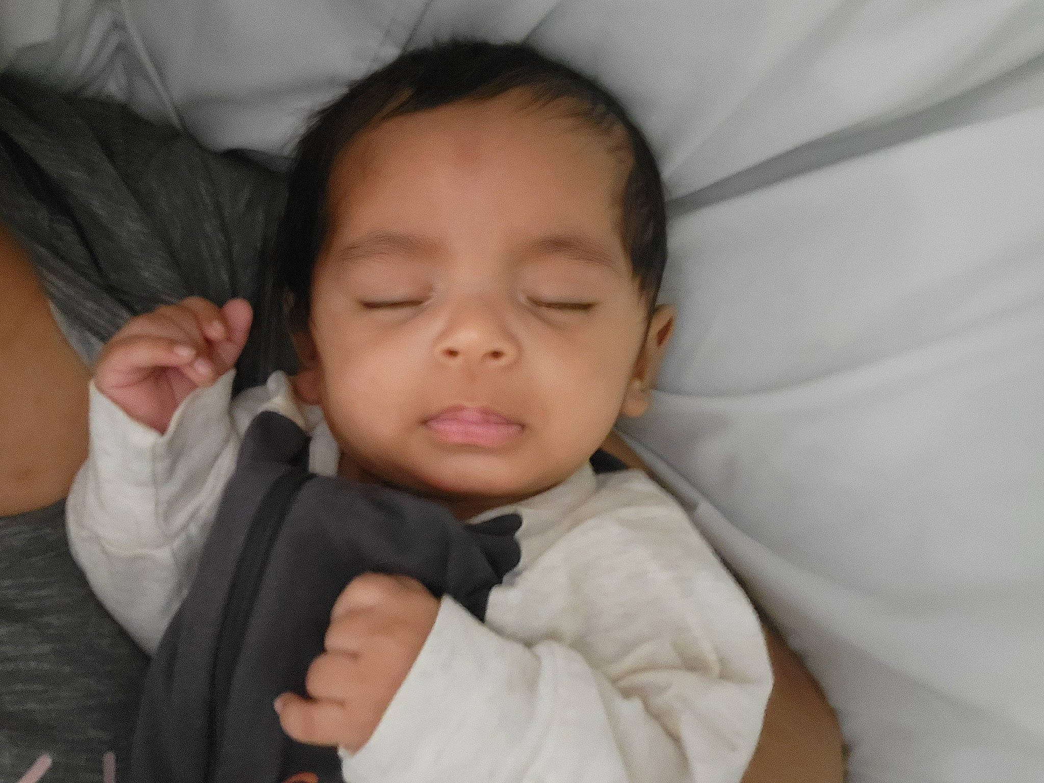 Prince is registered to the contest to win money with this photo: baby, cheek, chin, comfort, ear, eyebrow, finger, gesture, hairstyle, hand, happy, iris, lip, mouth, nose, person, skin, sleeve, smile, thumb