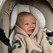 Mayson participe au concours pour gagner de l'argent avec cette photo : baby, child, hoodie, car_seat, smiling, face, blue_eyes, cozy, infant, cute, clothing, seatbelt, happy, portrait, young_child, indoors, comfort, apparel, baby_boy, casual