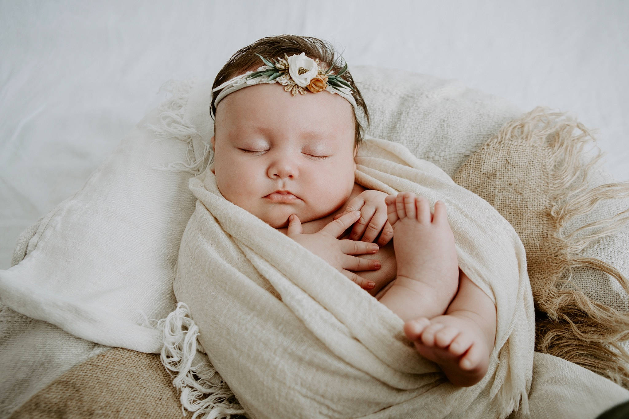 Luna is registered to the contest to win money with this photo: arm, baby, baby_sleeping, baby_toddler_clothing, cap, comfort, ear, eye, eyelash, fashion_accessory, gesture, grass, happy, head, headband, headpiece, jewellery, linens, person, skin