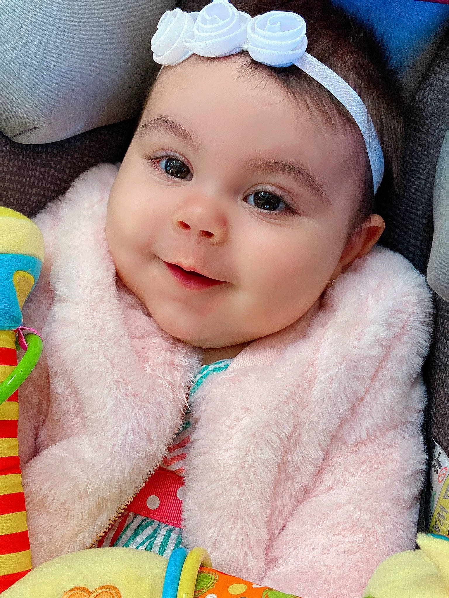 Isabella is registered to the contest to win money with this photo: baby, baby_toddler_clothing, cap, cheek, dress, eyelash, face, flash_photography, fun, happy, headwear, iris, joy, lip, outerwear, person, pink, skin, sleeve, smile