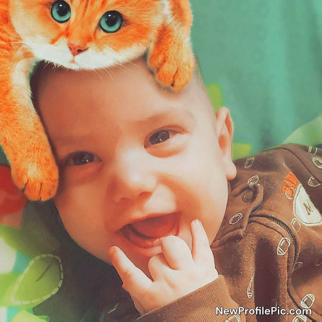 Gavriel joined the competition — help win amazing prizes! cat, cheek, child, ear, eye, eyelash, facial_expression, finger, forehead, gesture, happy, head, iris, lip, nose, organ, person, skin, smile, textile