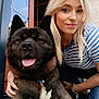 blonde_hair, bracelet, casual, closeup, dog, door, friendship, furry, happy, jeans, large_dog, outdoor, pet, portrait, reflection, smiling, striped_shirt, tongue_out, window, woman