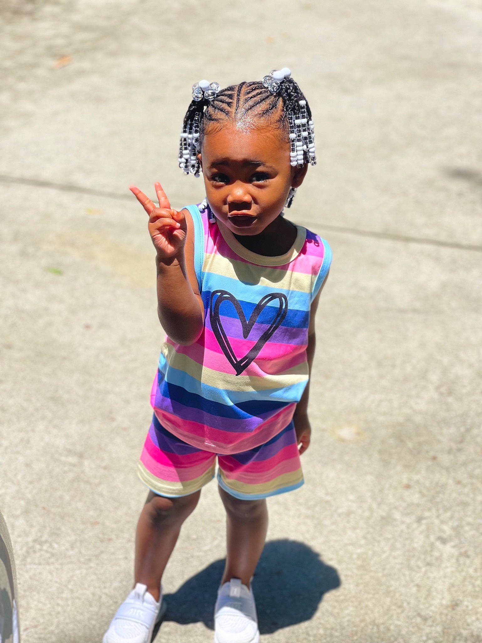 Kaleigh joined the competition — help win amazing prizes! asphalt, black_hair, dress, eyewear, fun, happy, human_leg, jewellery, leg, leisure, magenta, neck, necklace, person, plant, recreation, road, shoulder, smile, street_fashion