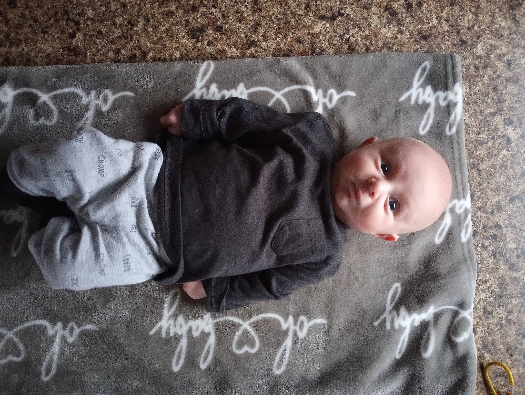 Mavrick Dale is registered to the contest to win money with this photo: asphalt, baby, baby_toddler_clothing, beauty, chalk, child, comfort, concrete, flooring, font, grey, handwriting, illustration, linens, person, road_surface, room, sidewalk, textile, toddler