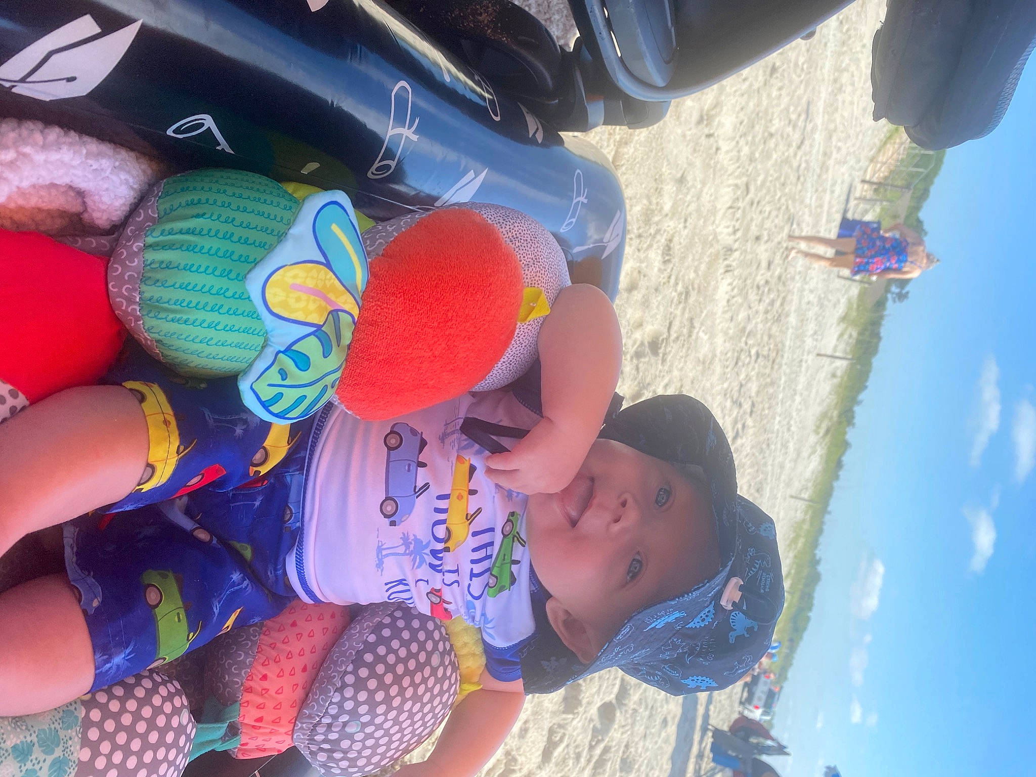 Westyn is registered to the contest to win money with this photo: azure, blue, cloud, cool, electric_blue, fun, happy, hat, headwear, human_leg, leg, leisure, person, personal_protective_equipment, recreation, red, sky, snapshot, summer, thigh