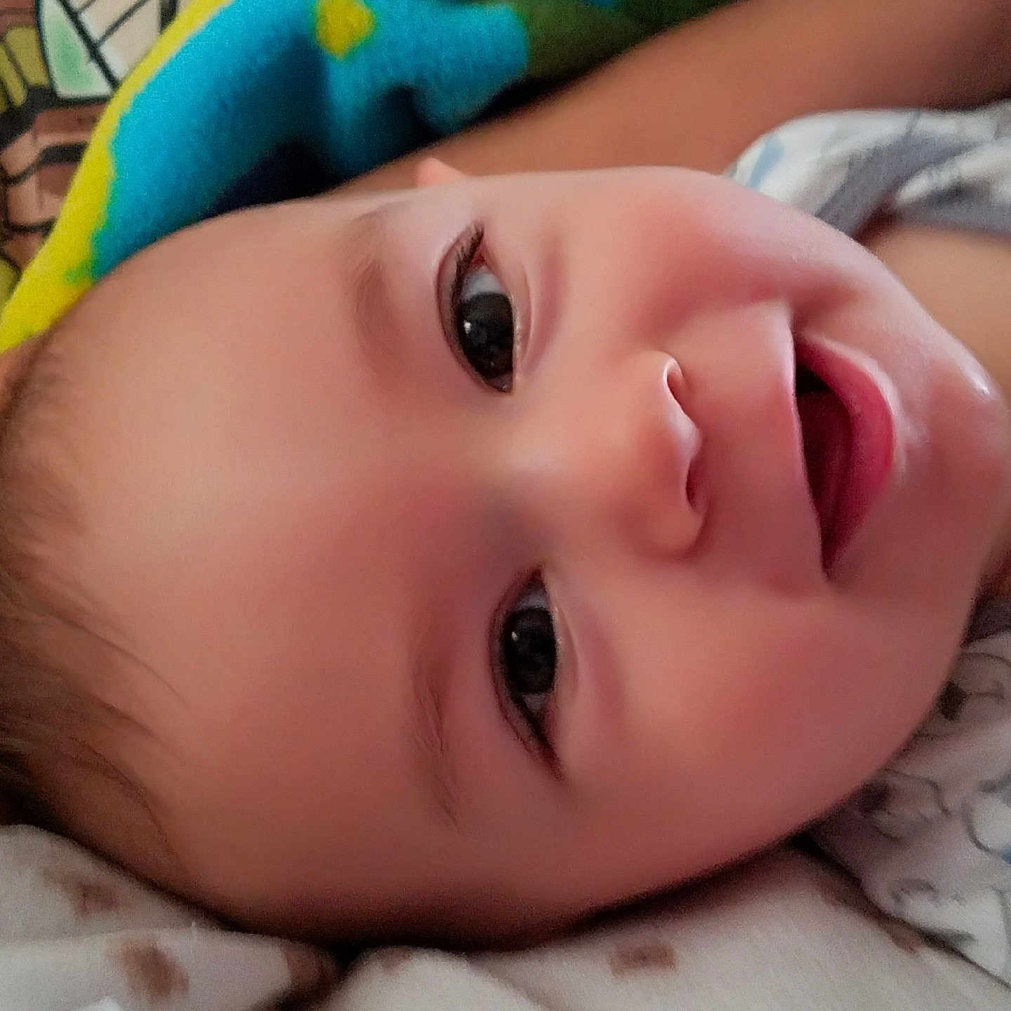 Abel is registered to the contest to win money with this photo: cheek, child, chin, close_up, eye, eyebrow, face, finger, forehead, girl, hand, head, infant, iris, lip, mouth, nose, skin, smile, toddler