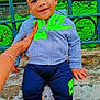 Layhann participe au concours pour gagner de l'argent avec cette photo : toddler, child, smiling, sitting, clothing, nike, hoodie, shorts, sandals, hand, fence, greenery, outdoor, portrait, happy, person, footwear, stone, casual, daylight