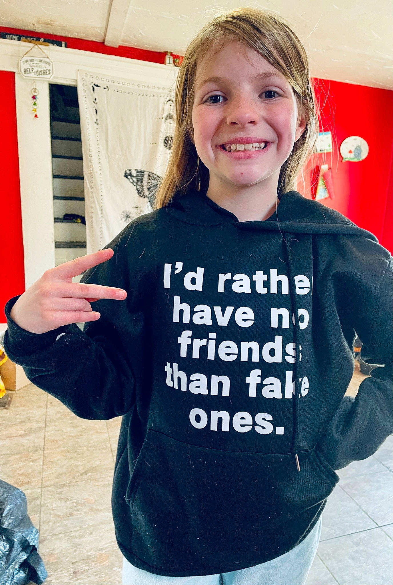 Piper joined the competition — help win amazing prizes! blond, electric_blue, finger, fun, gesture, hair, happy, jersey, joint, joy, neck, person, shoulder, sleeve, smile, sportswear, standing, t_shirt, textile, thigh