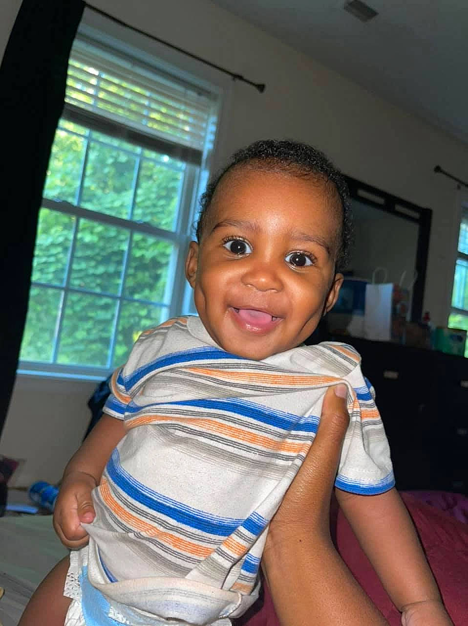 Jeremiah joined the competition — help win amazing prizes! black_hair, cheek, chest, electric_blue, eyebrow, flash_photography, flooring, fun, happy, joy, leisure, nose, person, picture_frame, sitting, skin, smile, t_shirt, television, toddler