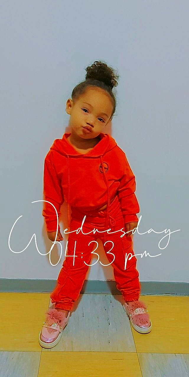 Malouane participe au concours pour gagner de l'argent avec cette photo : baby, baby_toddler_clothing, child, clothing, costume, facial_expression, fashion_design, flooring, font, fun, gesture, happy, leg, magenta, outerwear, person, sleeve, smile, standing, t_shirt