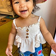Nova joined the competition — help win amazing prizes! carpet, casual_clothing, child, cute, denim_shorts, footwear, hair, happy, home, indoor, living_room, patchwork, person, playful, portrait, smiling, standing, toddler, white_top, young_child