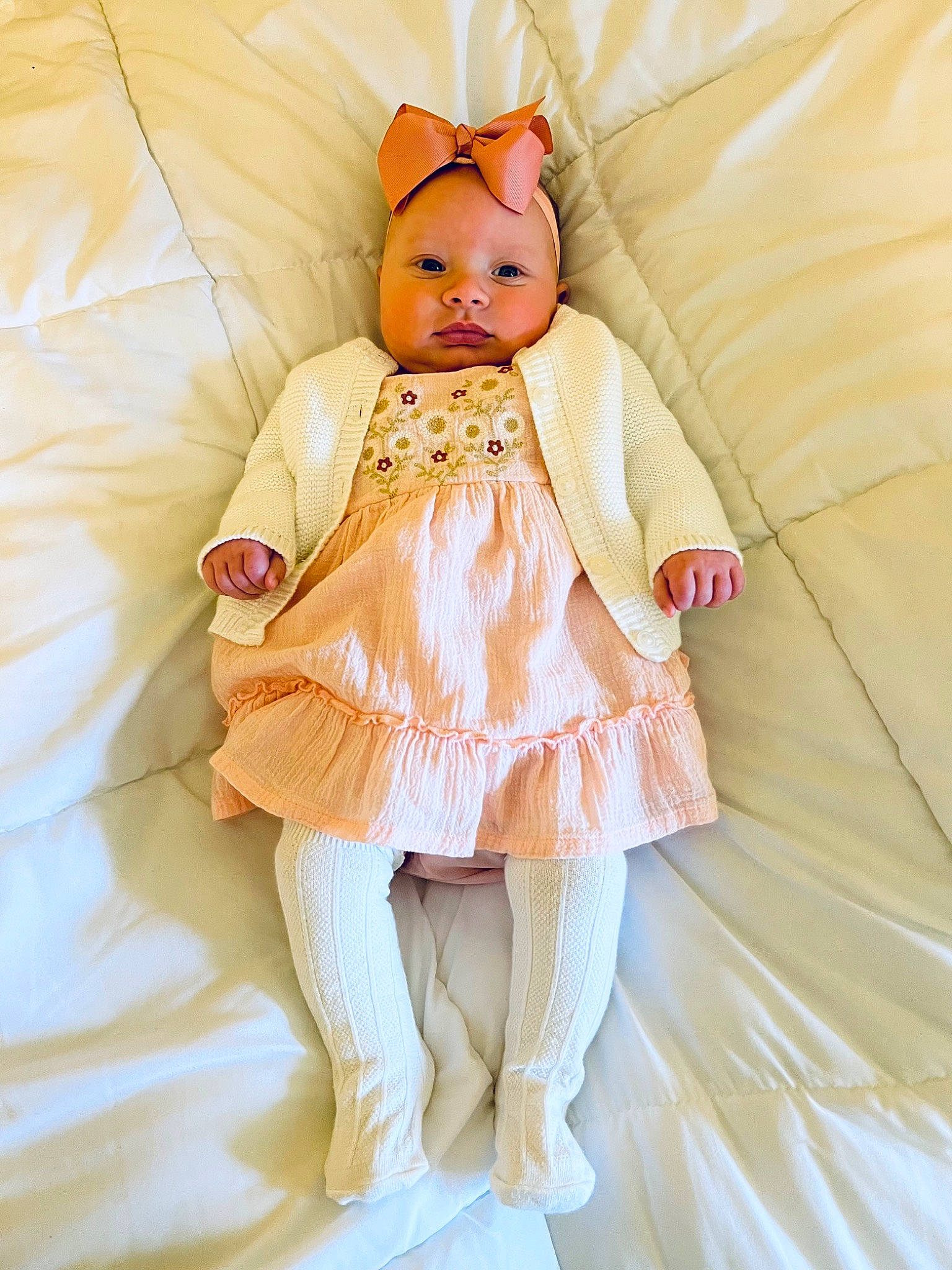 Lily is registered to the contest to win money with this photo: baby_products, baby_toddler_clothing, bedding, costume, doll, dress, fashion_accessory, fashion_design, fur, headpiece, linens, mythical_creature, pattern, peach, person, pink, plush, ruffle, stuffed_toy, toy