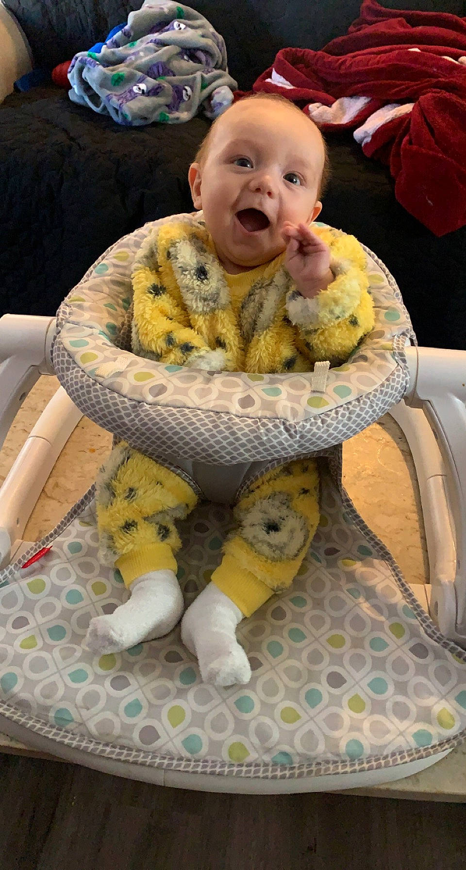 Everett is registered to the contest to win money with this photo: baby, baby_carriage, baby_products, baby_safety, baby_toddler_clothing, chair, child, comfort, fun, happy, infant_bed, linens, mammal, person, product, room, sitting, smile, stuffed_toy, toddler
