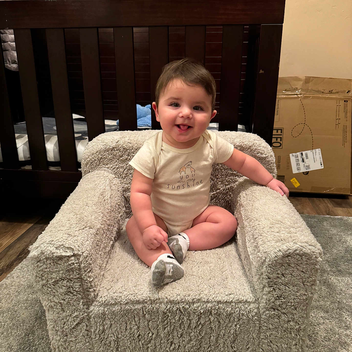 Mason joined the competition — help win amazing prizes! armchair, baby, box, chair, clothing, couch, crib, cushion, face, footwear, furniture, head, homedecor, indoors, infantbed, person, photography, portrait, shoe, sitting