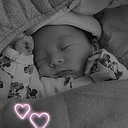 Louna a rejoint le concours — aidez-le/la à gagner de superbes lots ! baby, sleeping, newborn, blanket, hat, mickey_mouse, clothing, cute, peaceful, face, infant, cozy, portrait, black_and_white, hands, cute_outfit, soft, resting, indoors, heart_doodle