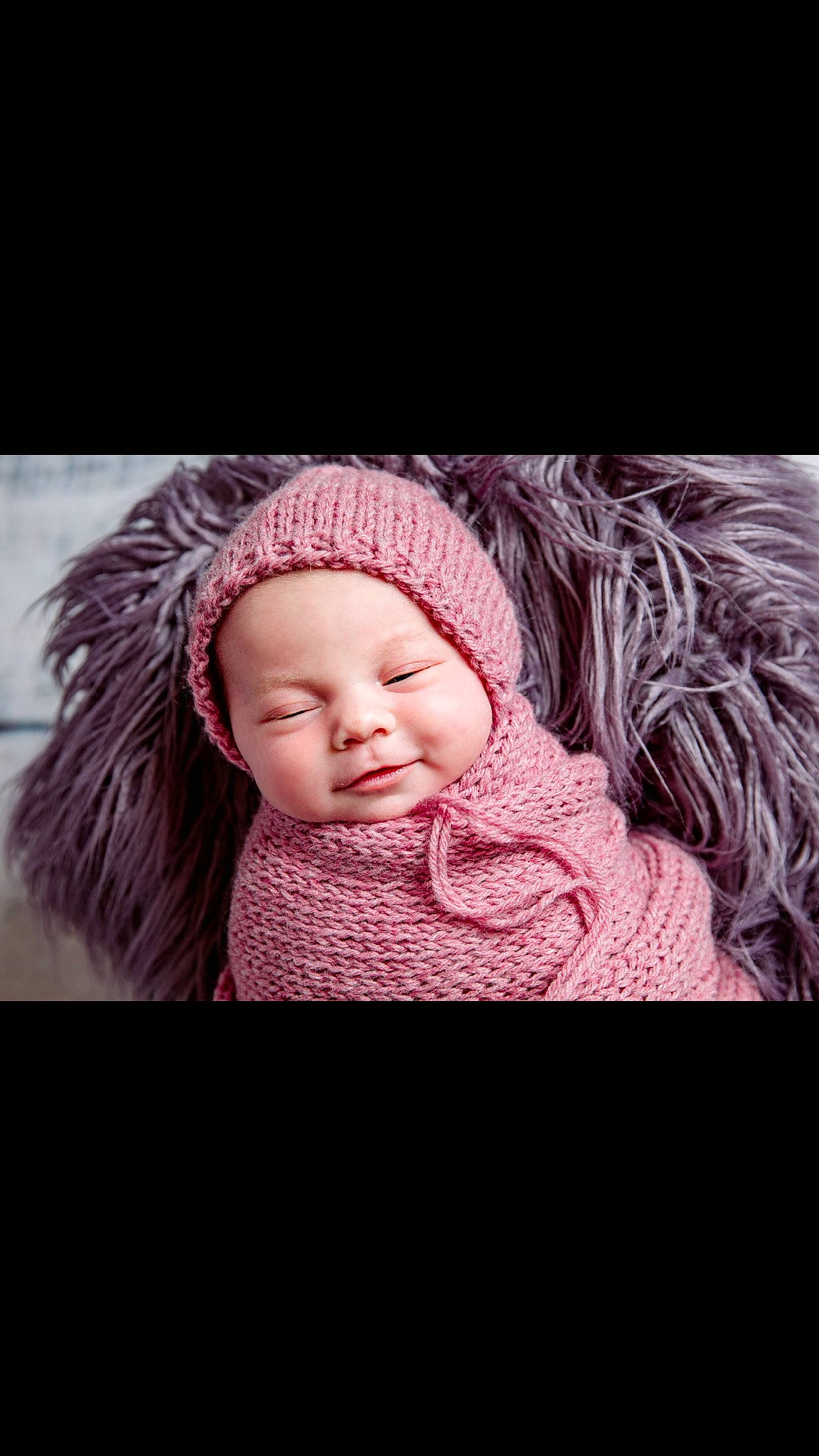 Macey joined the competition — help win amazing prizes! baby, baby_toddler_clothing, cap, comfort, eye, flash_photography, fur, happy, headgear, headwear, jacket, knit_cap, linens, lip, magenta, person, pink, sleeve, smile, toddler
