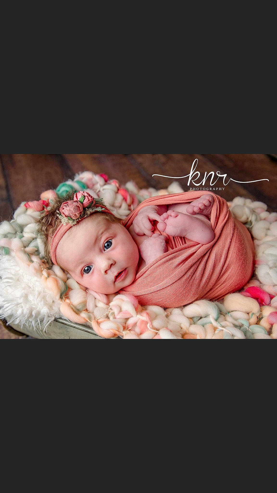 Macey is registered to the contest to win money with this photo: baby, baby_toddler_clothing, cheek, comfort, fashion_accessory, flash_photography, fur, hair_accessory, happy, headband, headpiece, headwear, linens, magenta, pattern, person, petal, pink, sitting, sleeve