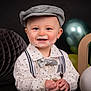 baby, boy, smiling, face_paint, cake_frosting, hat, cap, shirt, bow_tie, suspenders, hands, party, balloons, decoration, celebration, portrait, cute, child, happy, indoors