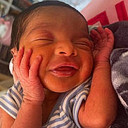 Kruz is registered to the contest to win money with this photo: architecture, baby, bed, bedroom, bodypart, building, clothing, face, finger, furniture, hand, head, hospital, newborn, person, photography, portrait, sleeping, t_shirt, towel