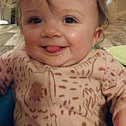 Raelynn joined the competition — help win amazing prizes! baby, infant, child, smiling, tongue_out, drooling, pajamas, onesie, face, eyes, hair, chubby_cheeks, closeup, portrait, indoor, floor, highchair, bowl, cute, happy